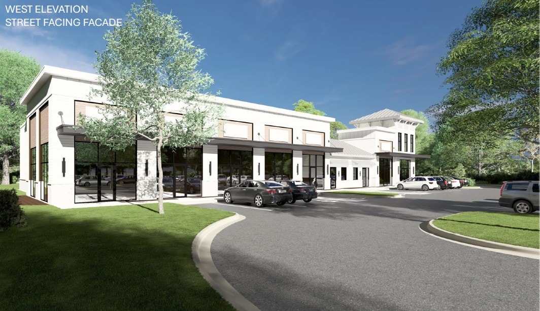 Upscale boutique retail storefronts in a coastal village setting